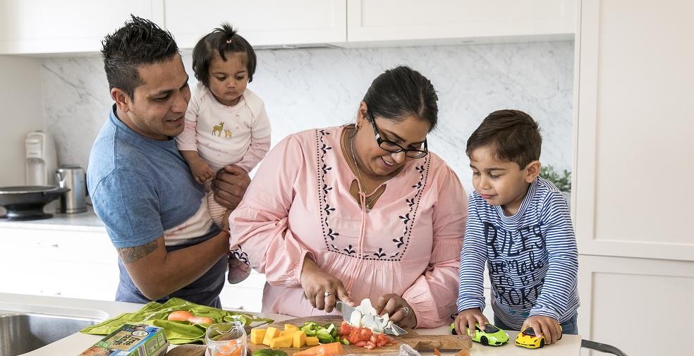 Family cooking dinner together