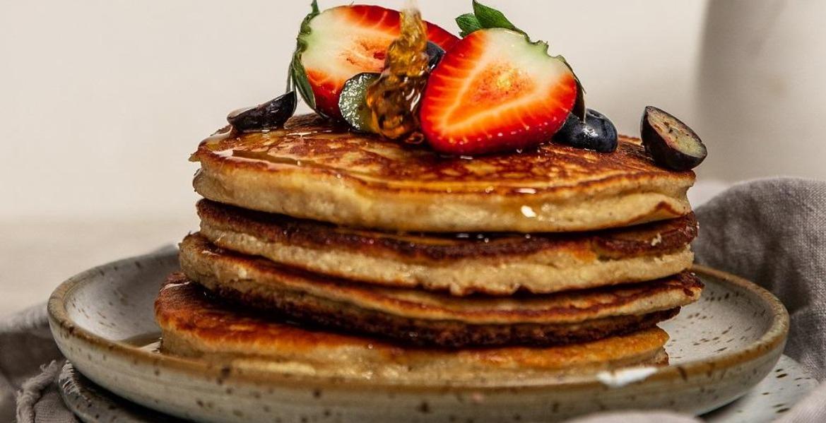 Blueberry pancakes with berries on top