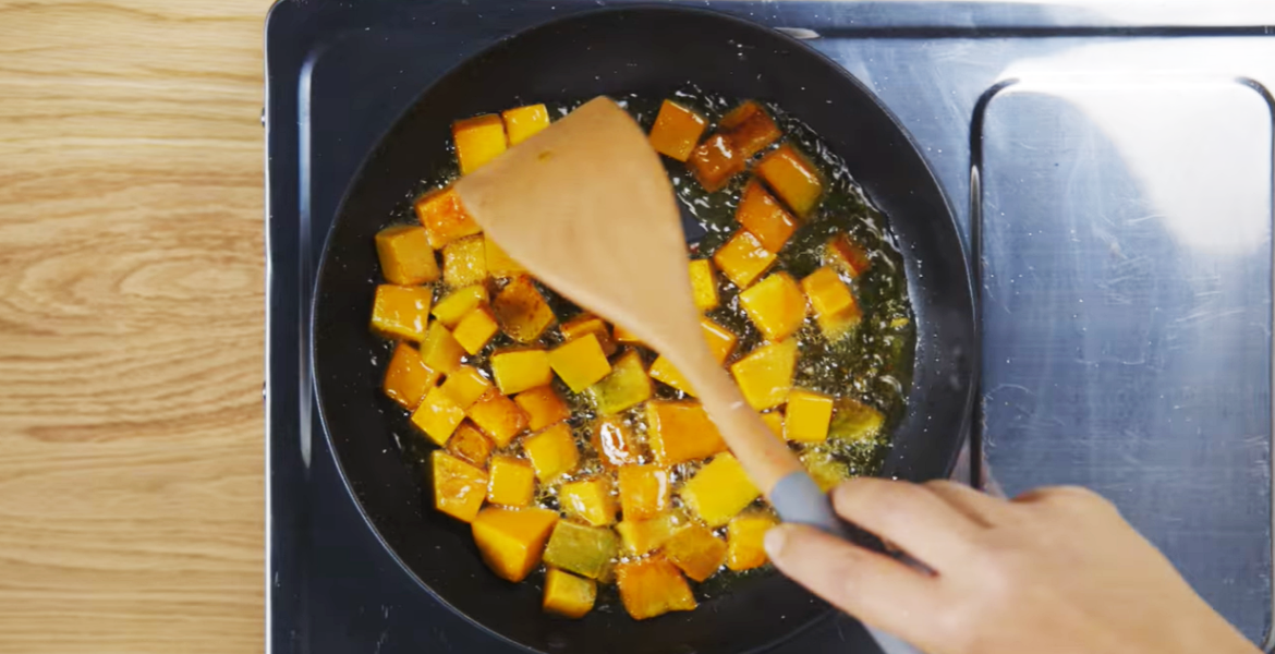 Pumpkin frying in a pan