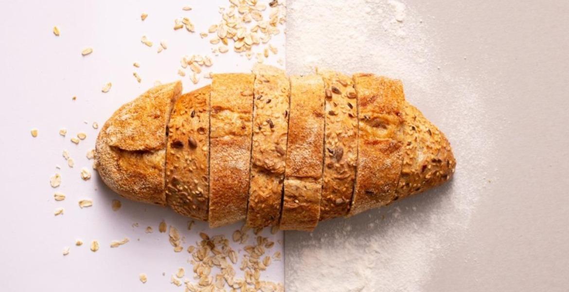 Sliced bread with scattered crumbs