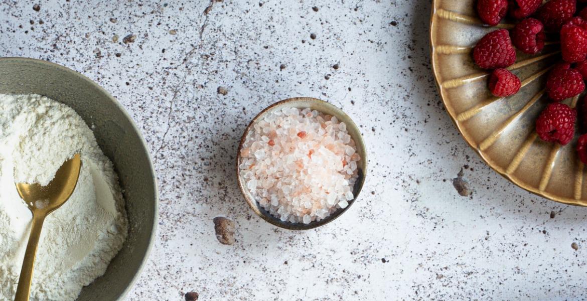 Cup of herb salt on kitchen counter