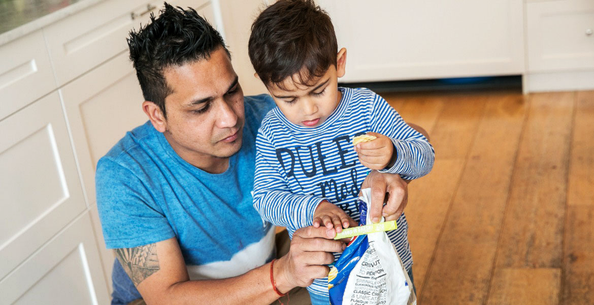 Father and son in kitchen