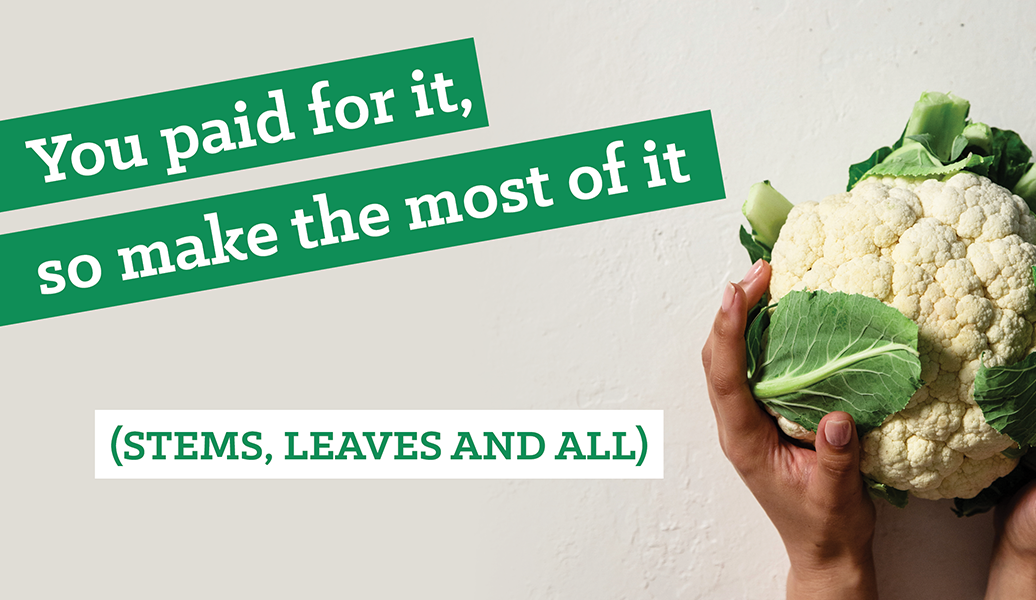 Hands holding whole cauliflower
